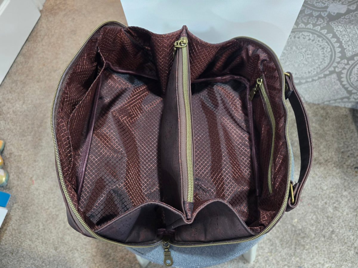 Charles Dopp Kit open showing brown ripstop lining and center zip divider