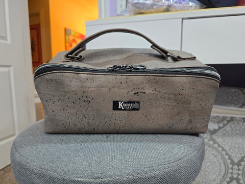 Charles Dopp Kit in natural gray cork with gunmetal hardware, front view