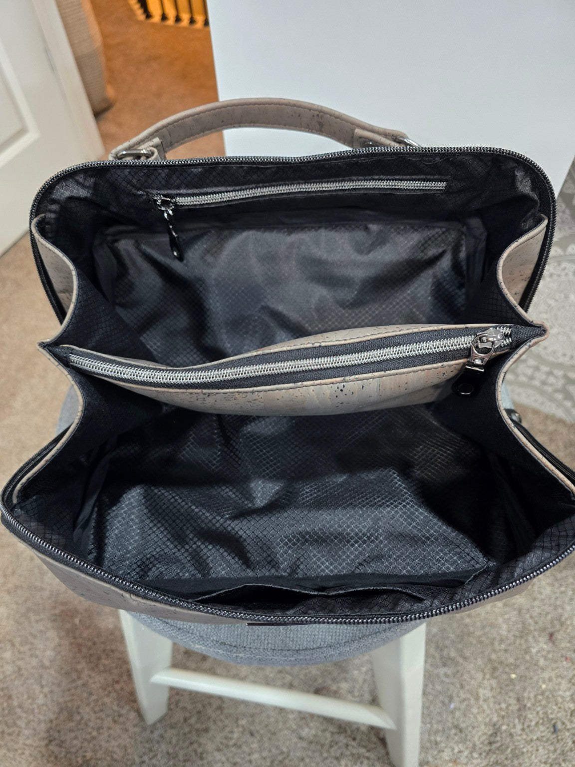Charles Dopp Kit open showing black ripstop lining and zip divider