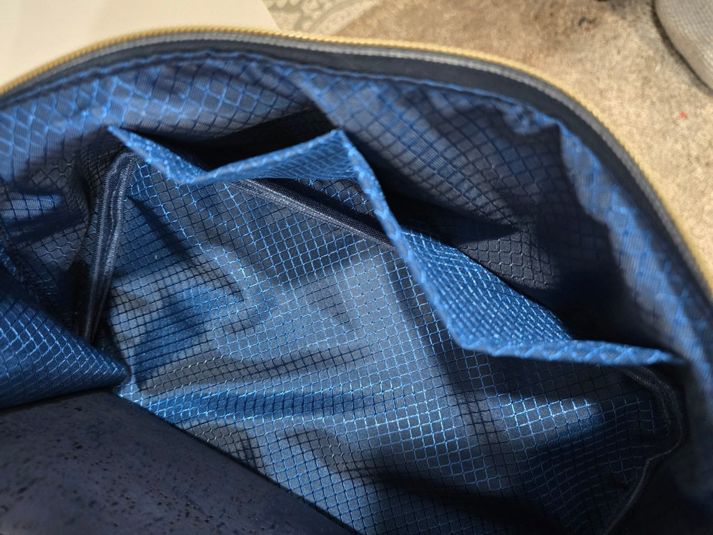 Blue ripstop interior slip pockets in the navy Charles Dopp Kit