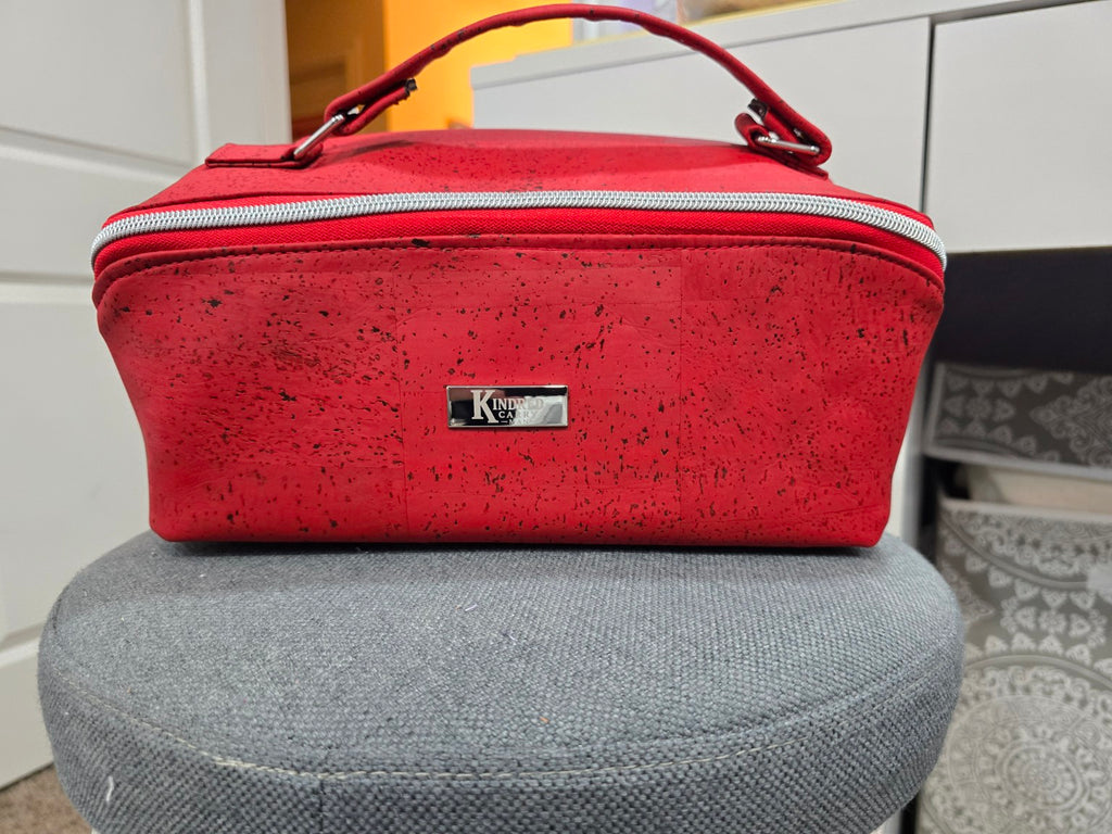 Charles Dopp Kit in red cork with silver hardware, front view