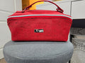 Charles Dopp Kit in red cork with silver hardware, front view