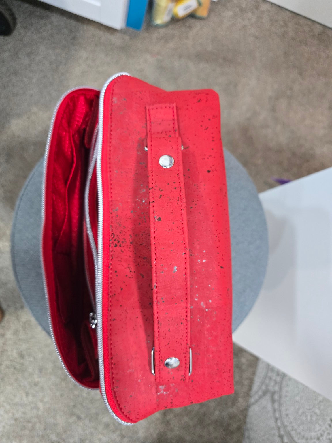 Red cork Charles Dopp Kit top view showing carry handle and wide opening
