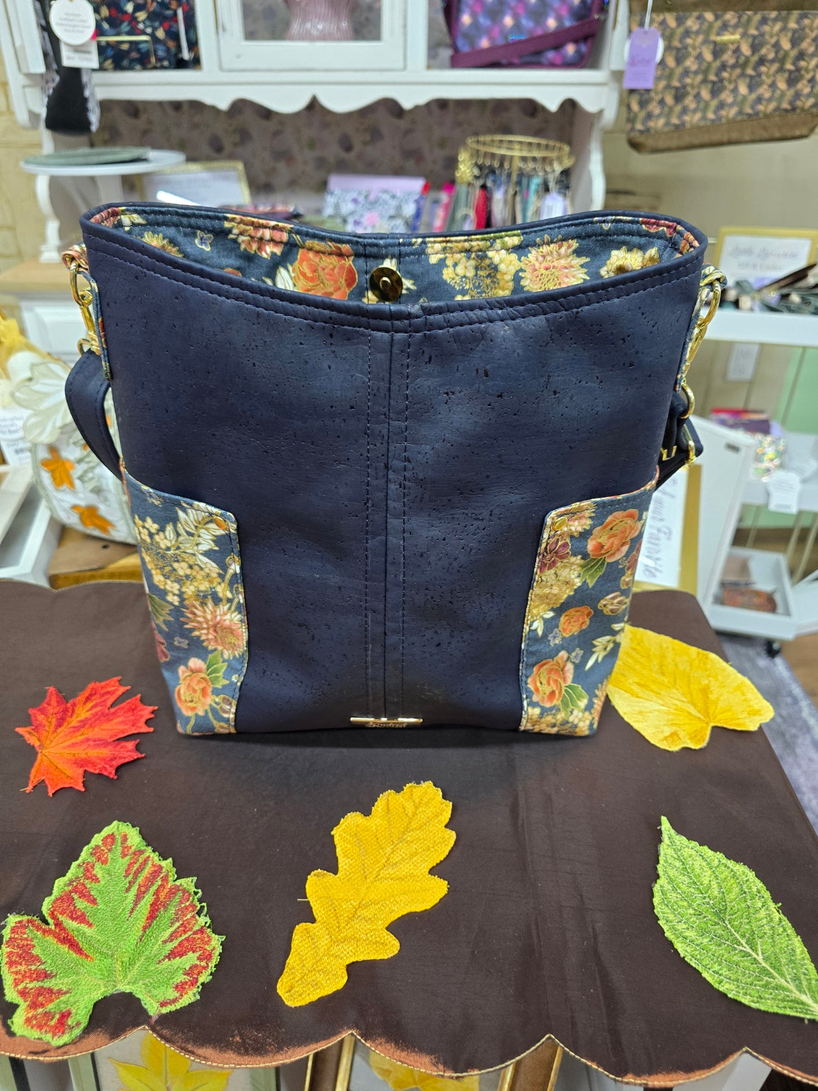 Kindred Carry Compass crossbody in fall blue floral shimmer