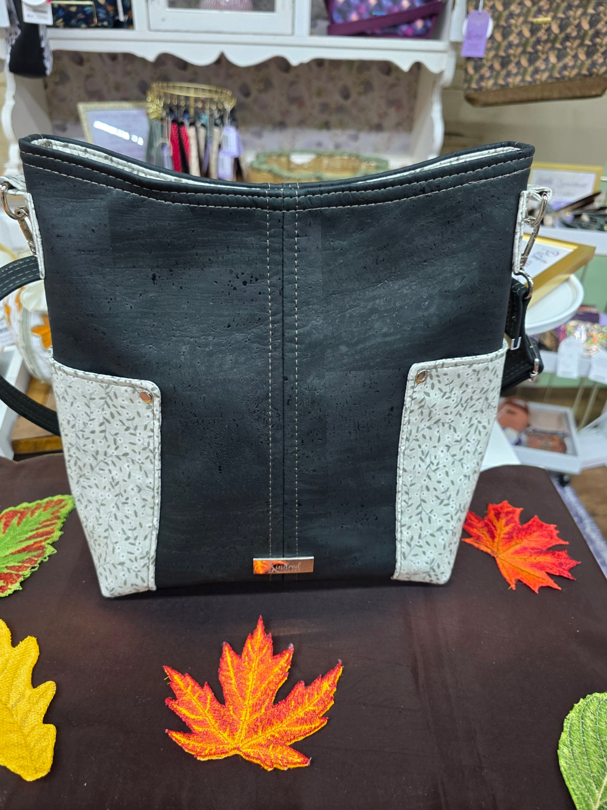 Kindred Carry Compass crossbody in darkest green