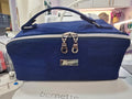 Royal-blue cork Charles Dopp Kit with matching carry handle, silver-tone double zipper and Kindred Carry Man label, front view