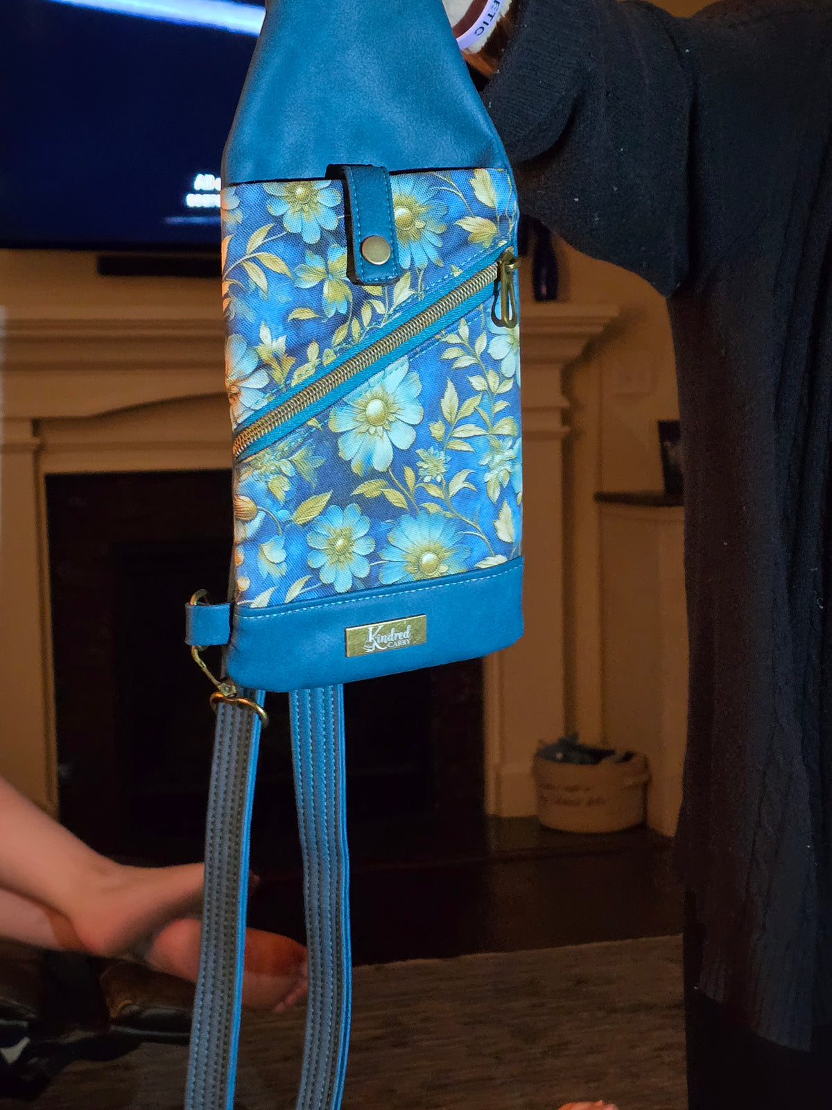 Kindred Carry Mini-Traveler sling in blue floral