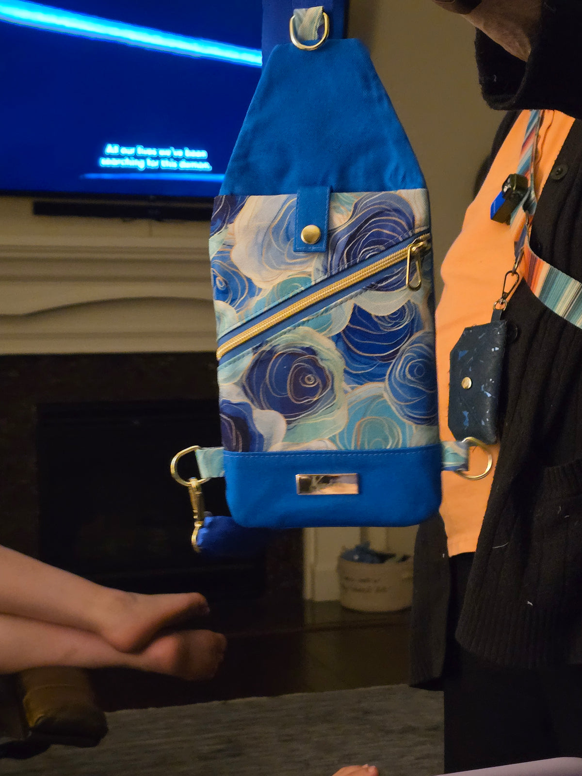 Kindred Carry Mini-Traveler Sling in blue and gold floral print
