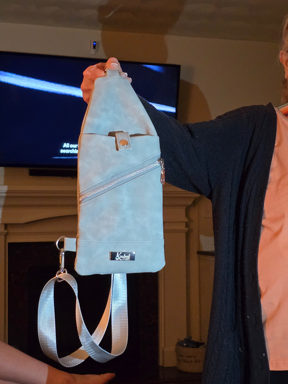 Kindred Carry Mini-Traveler sling in grey and silver