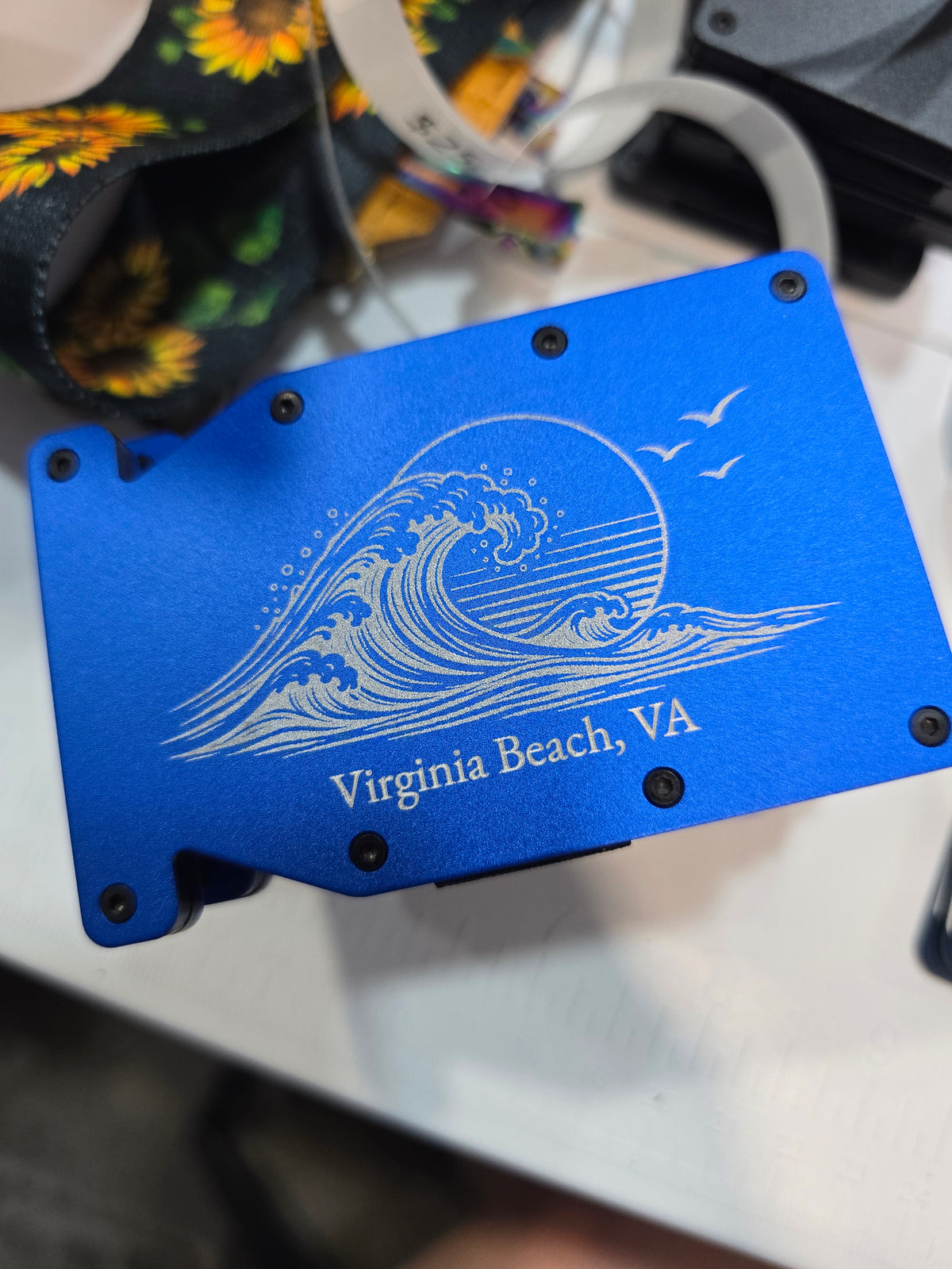 Kindred Carry Man Notch RFID wallet in royal blue with Virginia Beach wave design