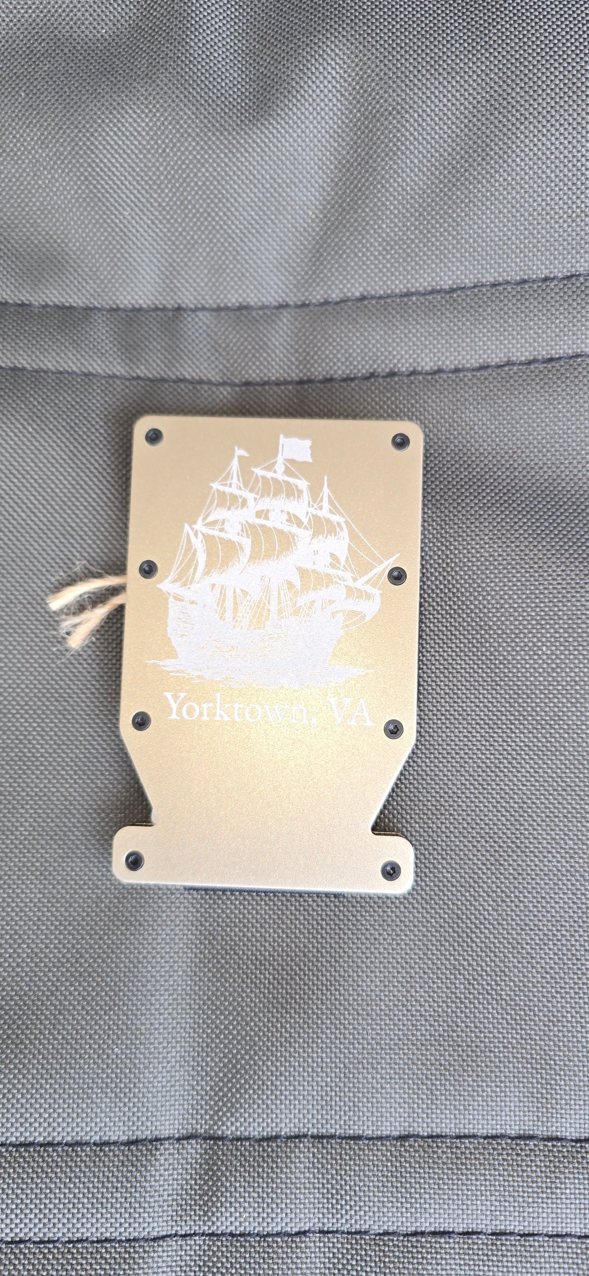 Kindred Carry Man Notch RFID wallet in tan with Yorktown ship design