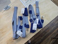 Kindred Carry phone slings with navy and white herringbone webbing and navy cork accents in multiple lengths