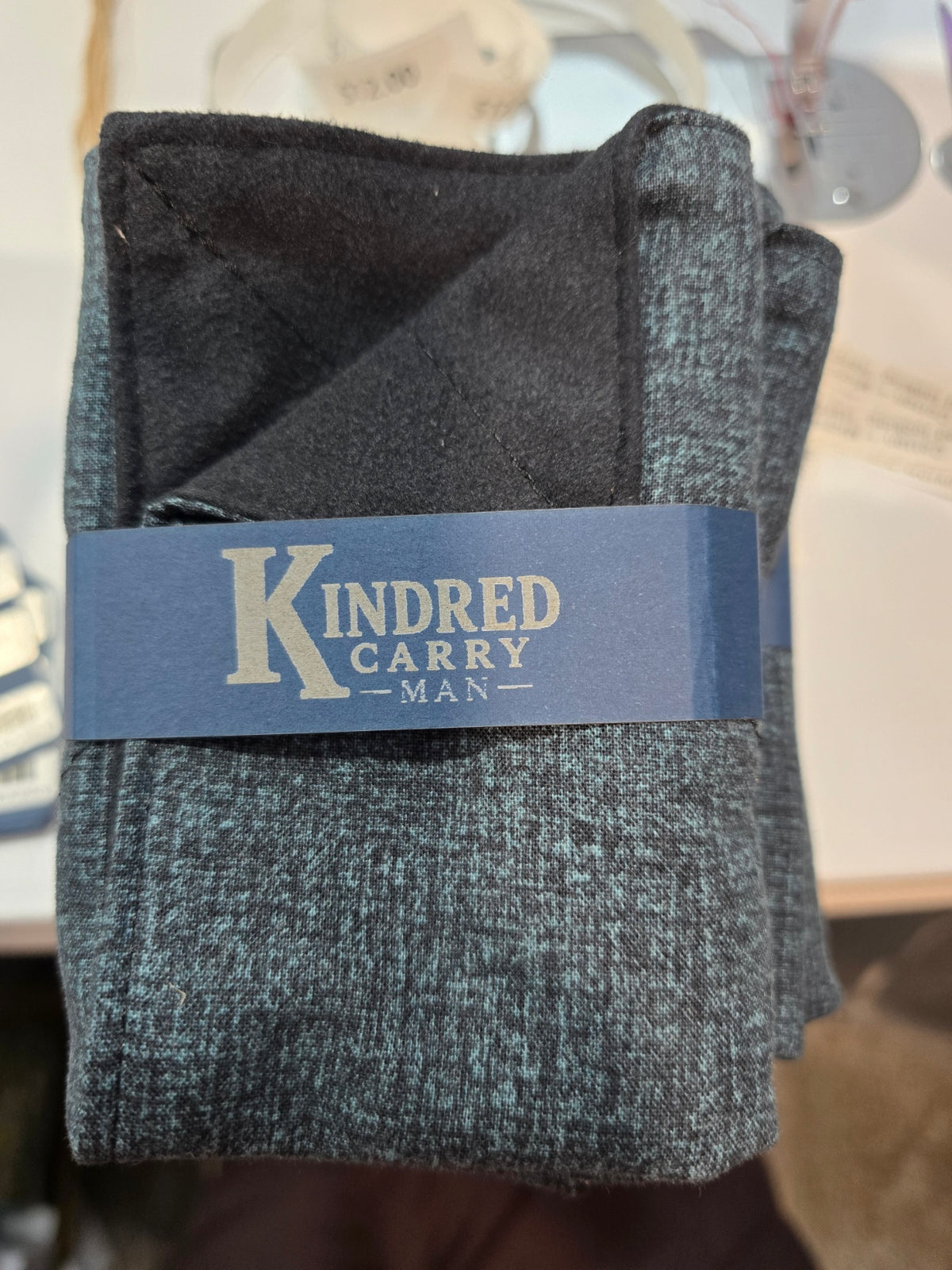 Kindred Carry Man Two-Faced Hank in blue-black textured cotton with black microsuede