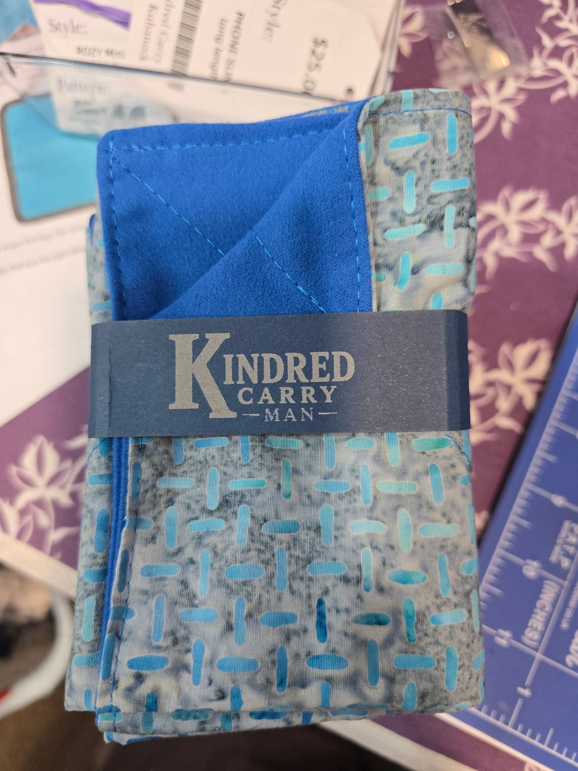 Kindred Carry Man Two-Faced Hank in blue dash print cotton with blue microsuede