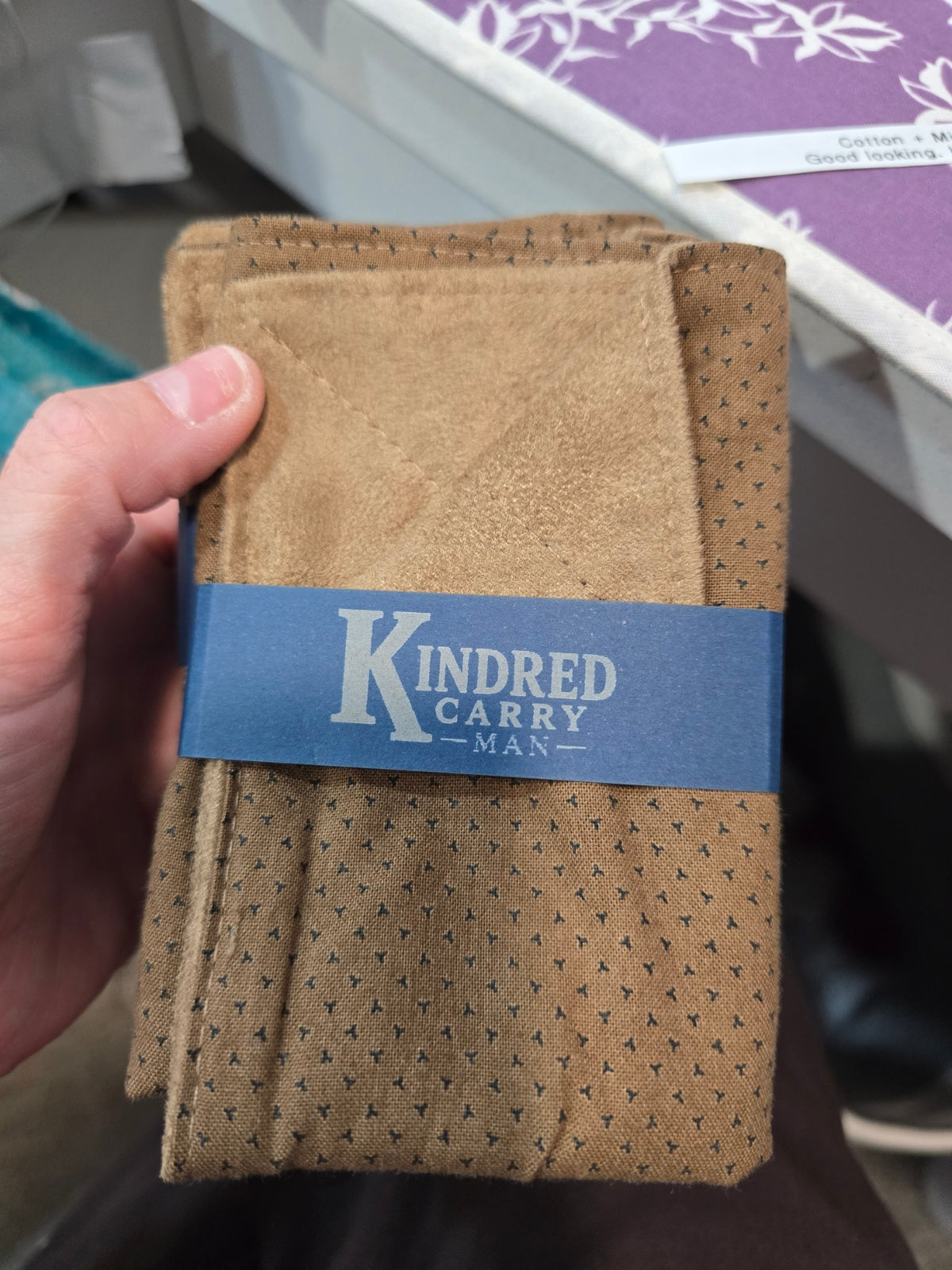 Kindred Carry Man Two-Faced Hank in brown mini print cotton with tan microsuede